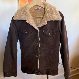 Vintage Levi’s orange tab sherpa lined corduroy trucker jacket.